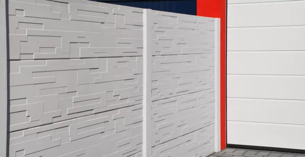 Betonzaun Motiv Tetris – verschachtelte geometrische Struktur als Sichtschutz im Baukastensystem Standard S